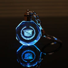 Load image into Gallery viewer, LED Light Crystal Bottle Keyring Keychain Car Logo Key Chain for Toyota Honda Opel Chevrolet Seat Ford Benz BMW Audi VW Kia